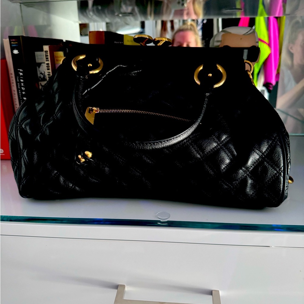 an original quilted stam bag- this is NOT from the re edition collection.